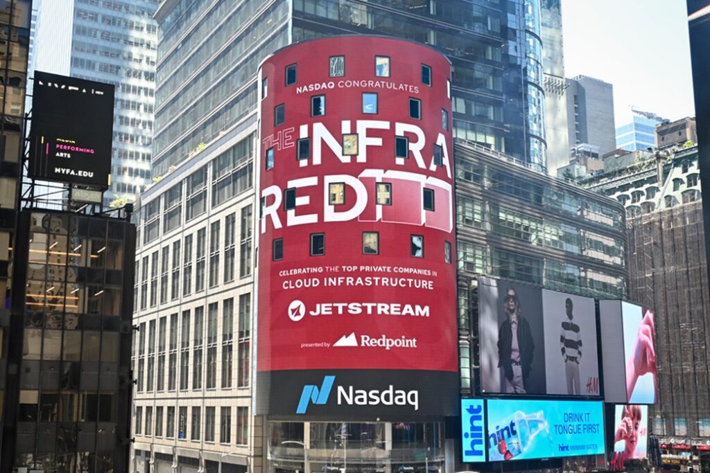 A billboard in New York City's financial district congratulates JetStream for being on Redpoint Ventures list of 100 most transformative companies for 2026.